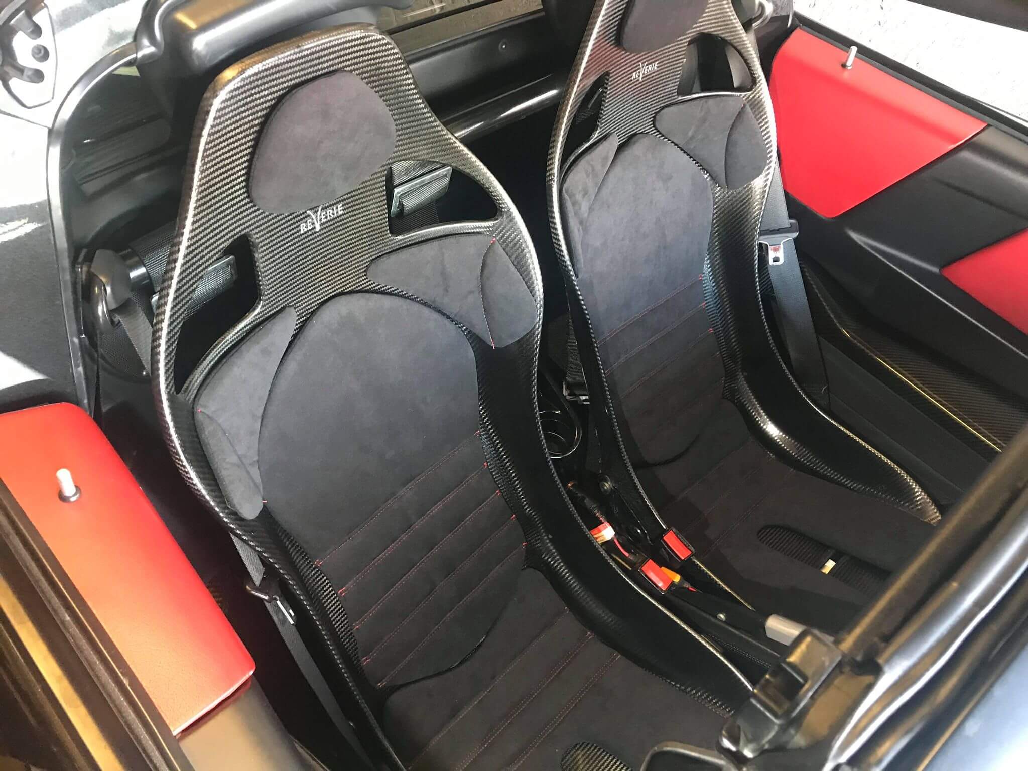 Two black carbon seats